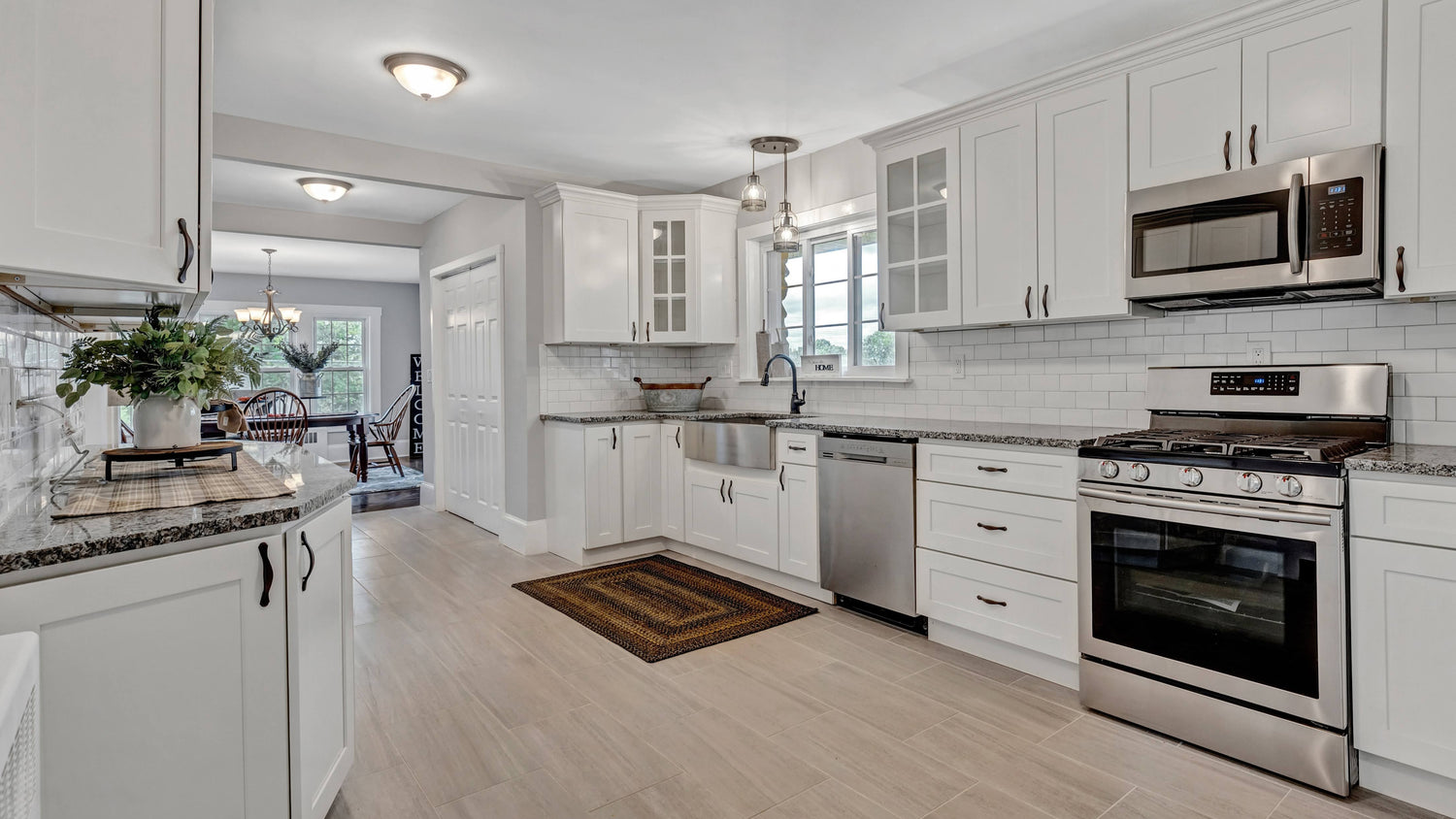Staged Kitchen & Dining Area With The Perfect Touch To Give Home Buyers A Visual opposed