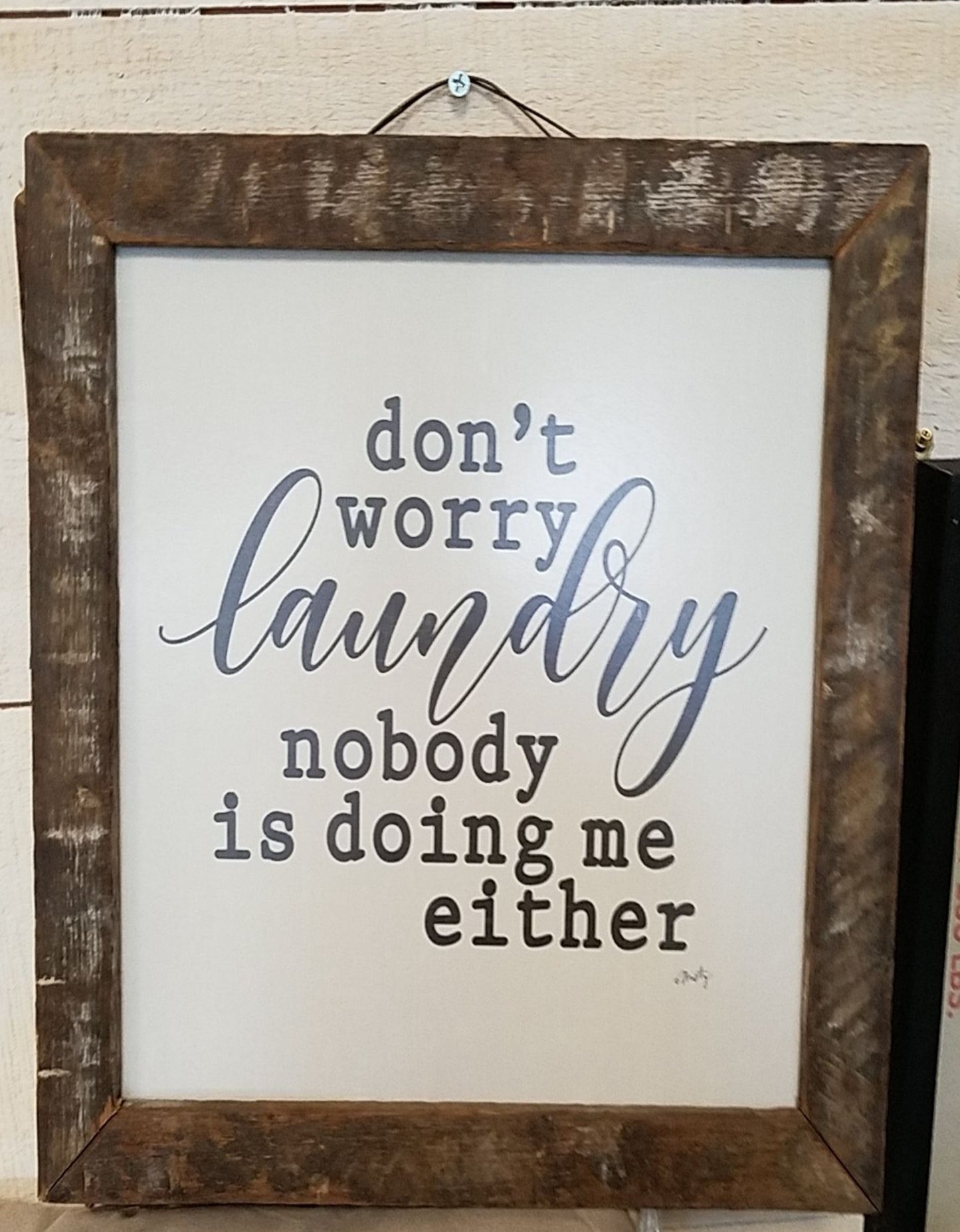 Beautiful print with multiple frame selections to choose from. This fun print reads, "Don't worry laundry nobody is doing me either." All frames have a vintage wire along the top of the frame for quick and easy wall hanging.