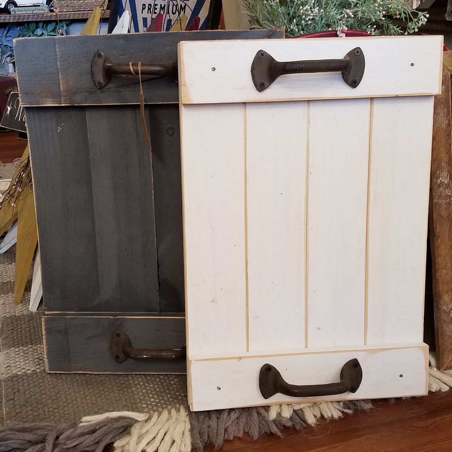 2 Trays, 1 White, 1 Black, Rustic Wooden Tray accented with metal detailed handles. Very Rustic and vintage look