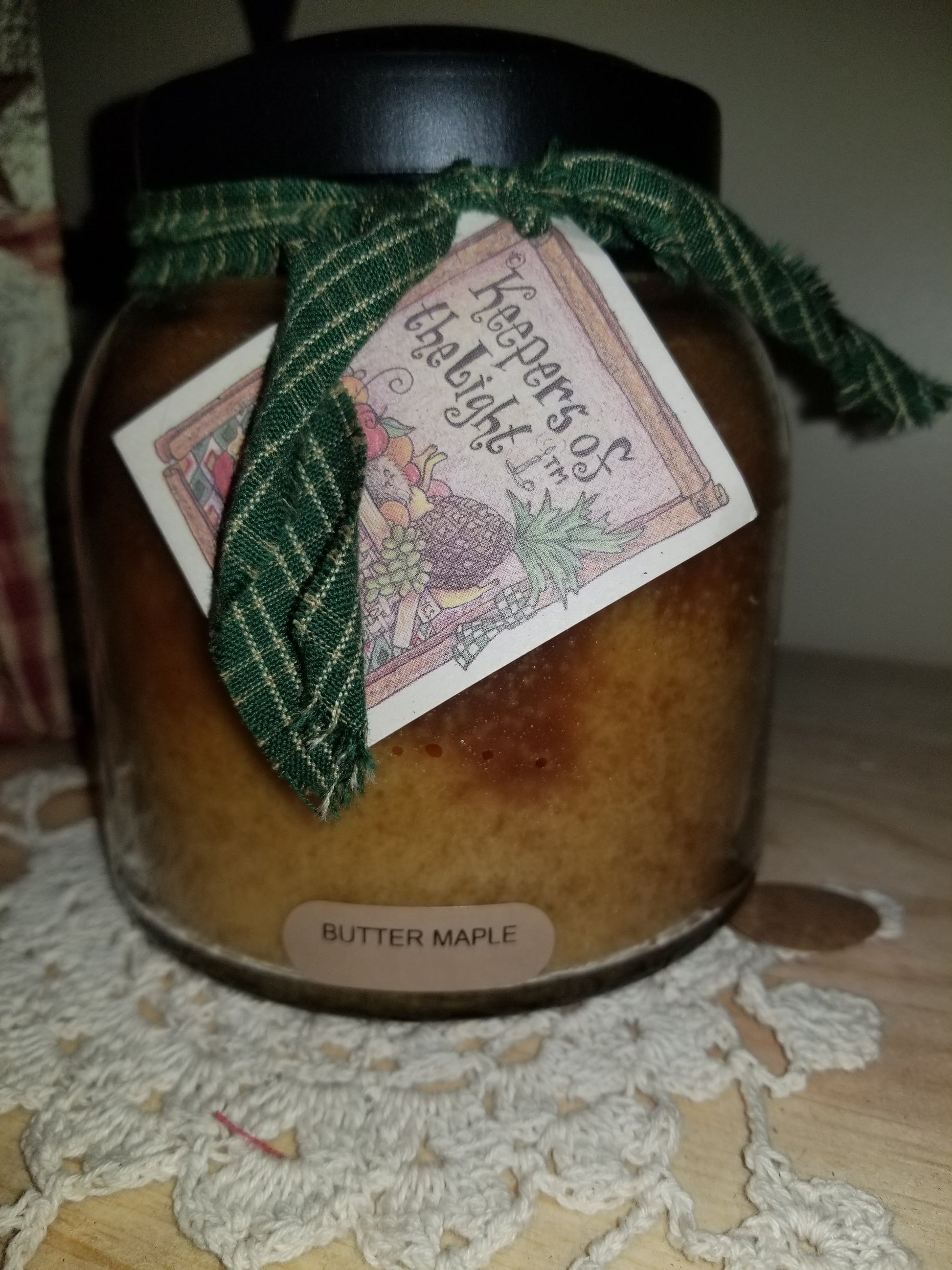 Butter Maple 34-ounce Papa jar candle burns for approximately 155 hours.