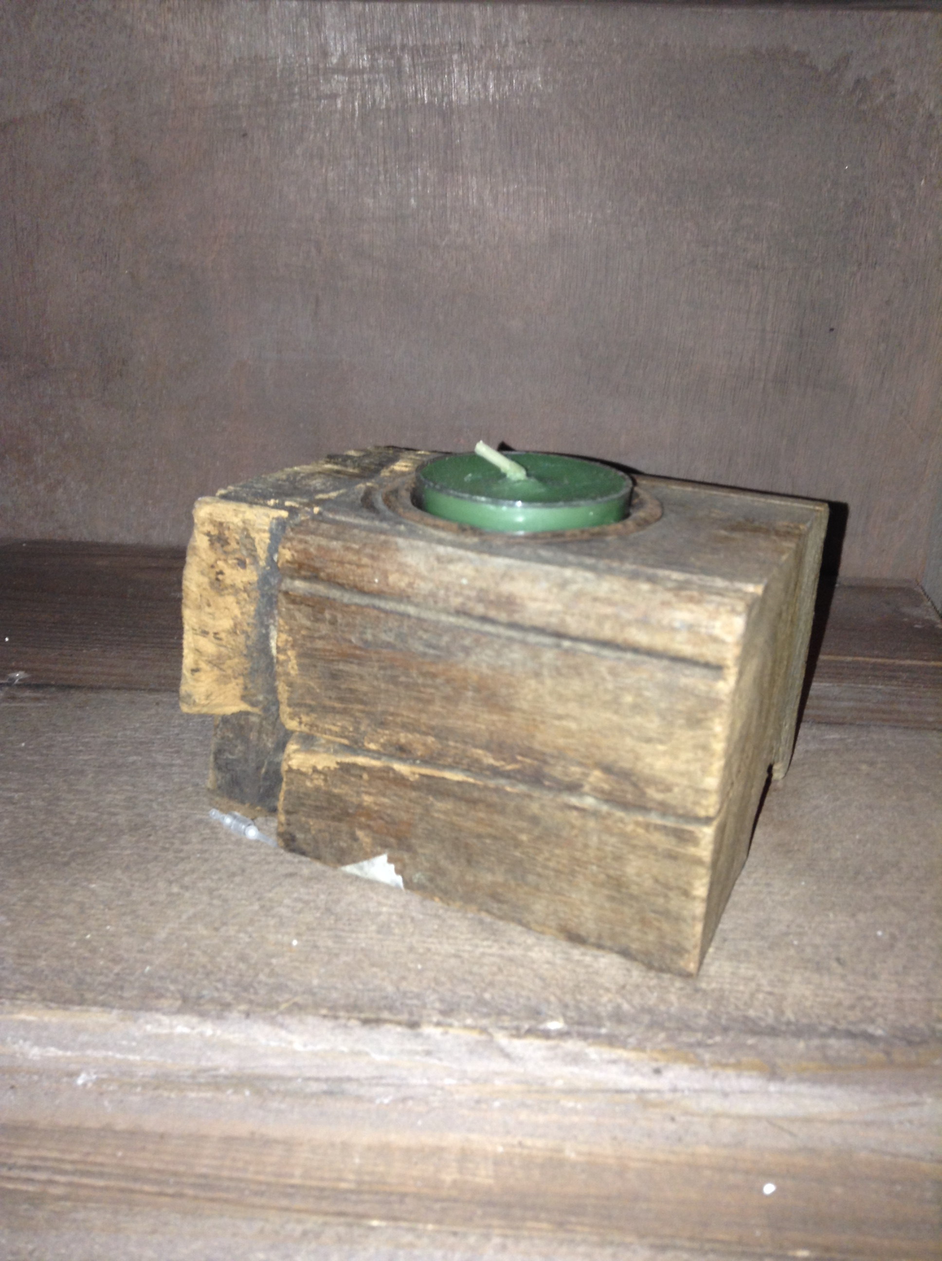 Holder measures 3.5" wide by 2.5" deep and 2.5" high with a 1.5" diameter candle pan. 