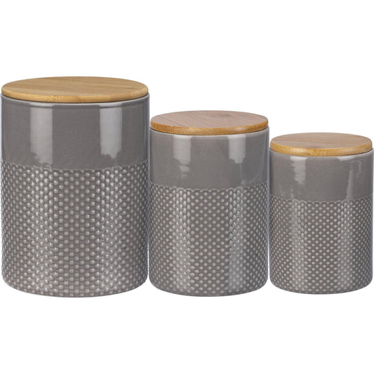 A set of three stoneware canisters with gray glaze and design. Canisters are double-sided and include wooden lids.