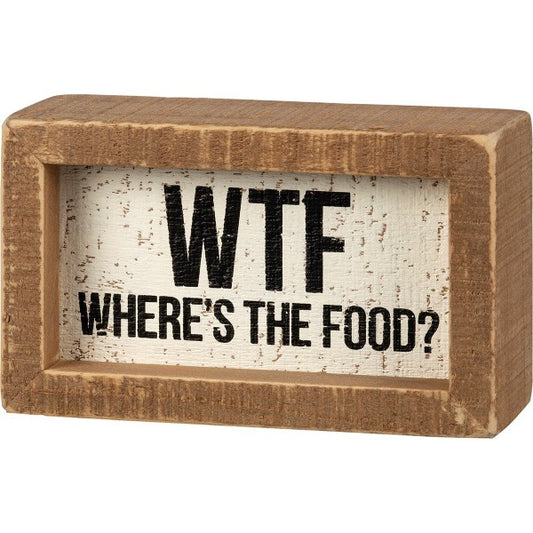 An inset wooden box sign featuring "WTF Where's The Food?" sentiment on a distressed cream background. 