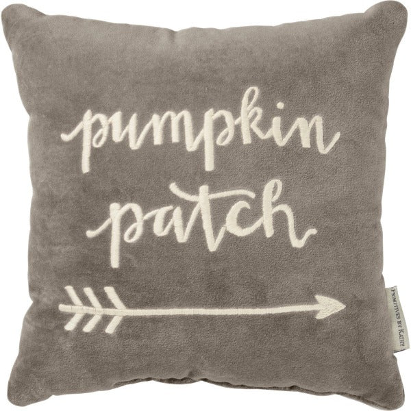 A luxe velvet pillow lending an embroidered "Pumpkin Patch" hand lettered sentiment with feathered arrow design. 