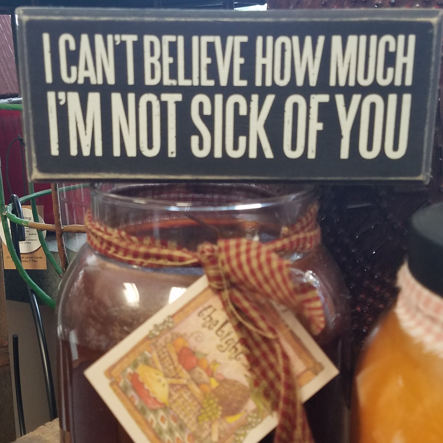 A classic wooden box sign featuring an "I Can't Believe How Much I'm Not Sick Of You" sentiment. 